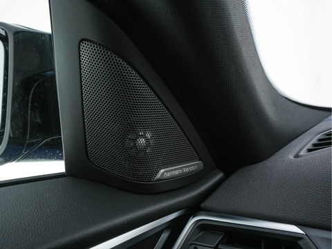 BMW i4 M50 M-Sportpack High Executive 84 kWh [ 3-Fase ] {SOH-97%} (INCL-BTW) *HEAD-UP | LASER-LED | LUXURY-LEATHER | HARMAN/KARDON | ADAPTIVE-CRUISE | BLIND-SPOT | TOP-VIEW | HEATED-SPORTSEATS | DAB+ | WIDE-COCKPIT | AMBIENT-LIGHT | NAVI-FULLMAP | 19