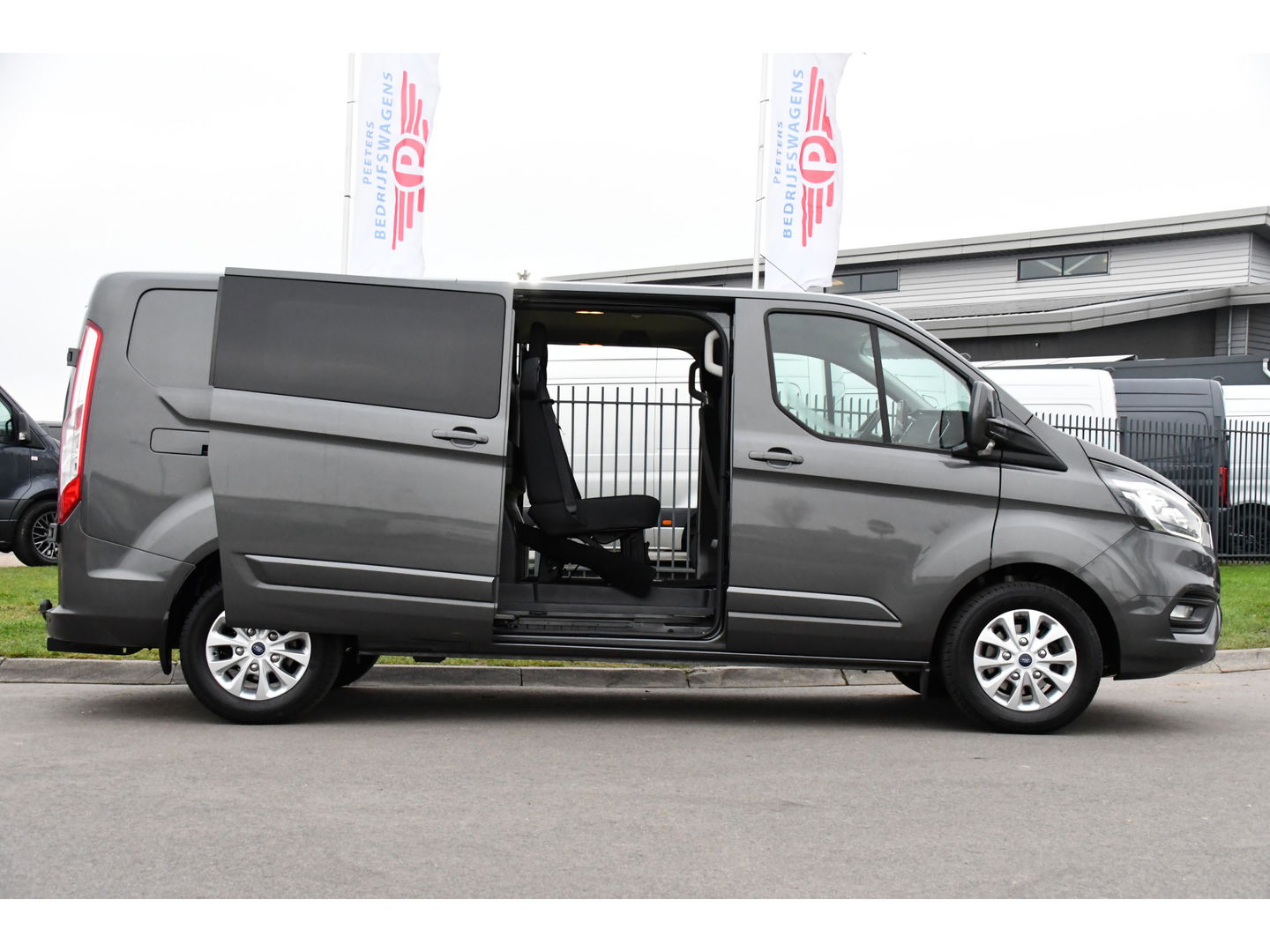 Ford Transit Custom 320 2.0 TDCI L2H1 Limited DC Cruise, Camera, Carplay, 170pk, Automaat, 2 x Schuifdeur, Sensoren, Led, Stoelverwarming, Uniek!