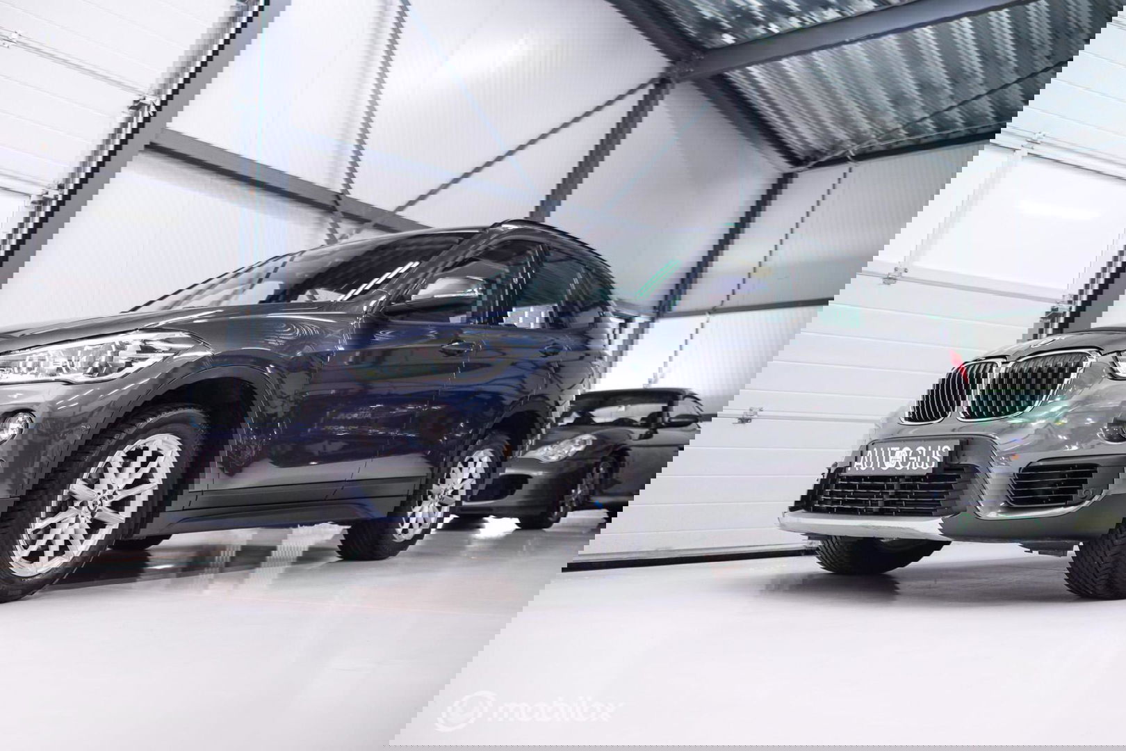 BMW X1 sDrive18i High Executive | 1e eigenaar | Dealer OH | Trekhaak | Leder | Sportstoelen | HUD | Stoelverwarming | Clima | LED |