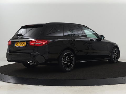 Mercedes-Benz C-Klasse 300e AMG Night | Adaptive cruise | Stoelverwarming | Carplay | Leder/Alcantara | Camera | Burmester Surround | Navigatie | Sfeerverlichting | Digital Cockpit | PHEV | Plug In