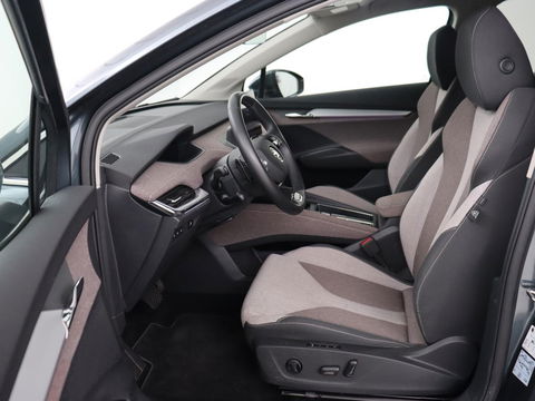Škoda Enyaq iV 80 | Warmtepomp | Trekhaak | Matrix LED | Adaptive cruise | Keyless | Camera | Half leder | Stuurverwarming | Memory | Navigatie | Climate control | Dodehoek detectie | Getint glas