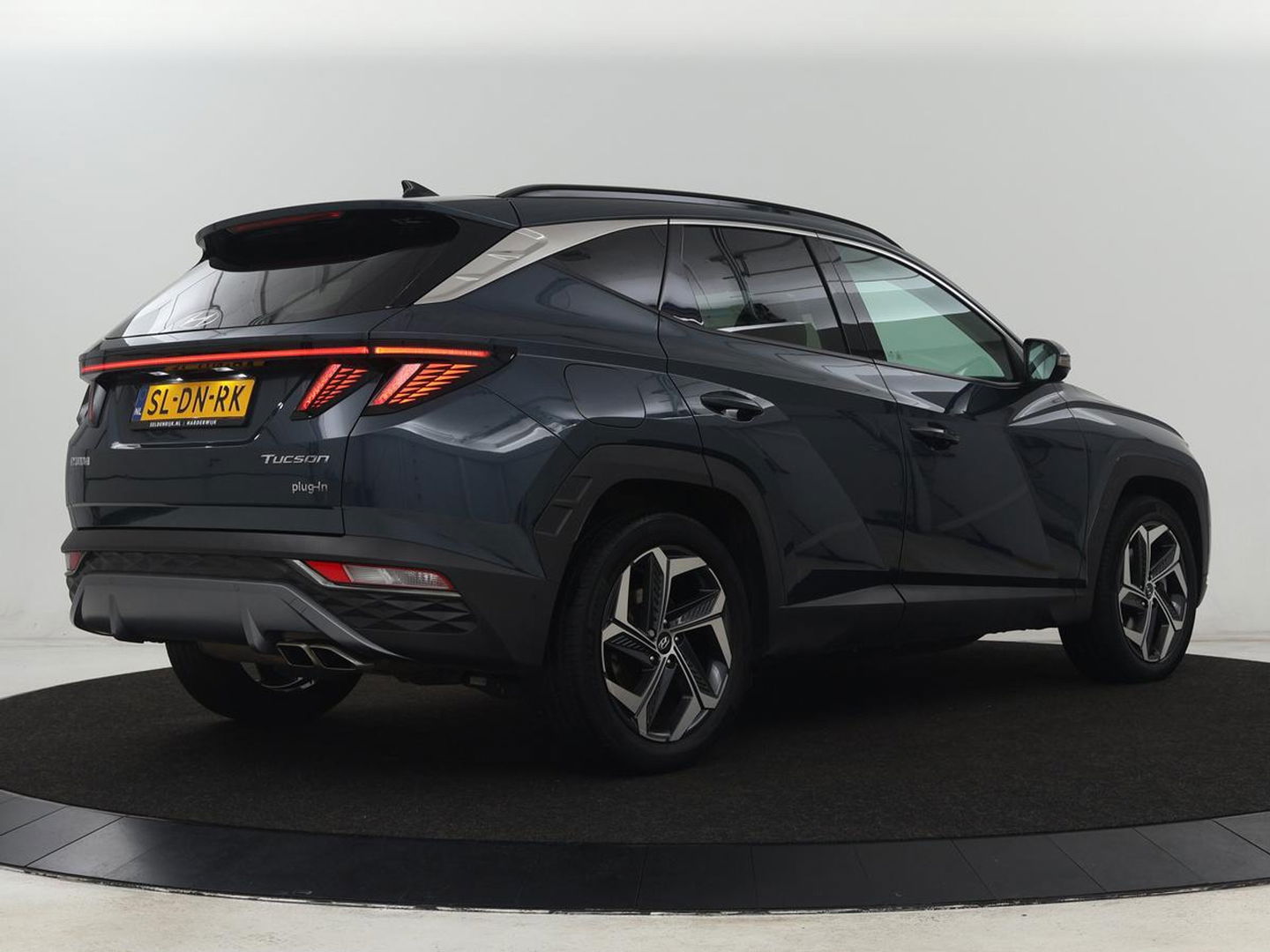 Hyundai Tucson 1.6 T-GDI PHEV Premium Sky AWD | Panoramadak | Stoelventilatie | Leder | 360 Camera | Carplay | Adaptive cruise | Keyless | Navigatie | Memory | Achterbankverwarming | Full LED | Plug In