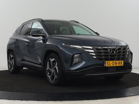 Hyundai Tucson 1.6 T-GDI PHEV Premium Sky AWD | Panoramadak | Stoelventilatie | Leder | 360 Camera | Carplay | Adaptive cruise | Keyless | Navigatie | Memory | Achterbankverwarming | Full LED | Plug In