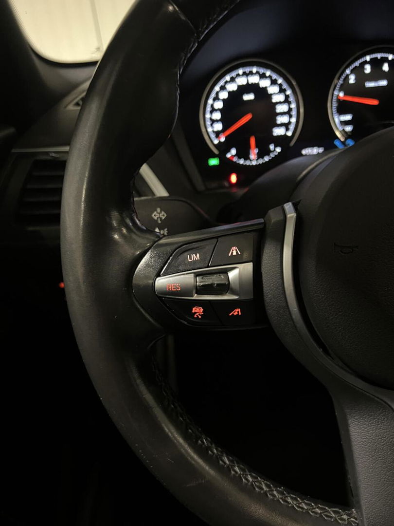 BMW 1 Serie 118i M-Sport Pano Leer H&K Shadow High Executive