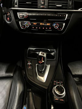 BMW 1 Serie 118i M-Sport Pano Leer H&K Shadow High Executive