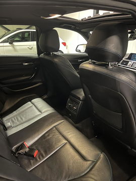BMW 1 Serie 118i M-Sport Pano Leer H&K Shadow High Executive