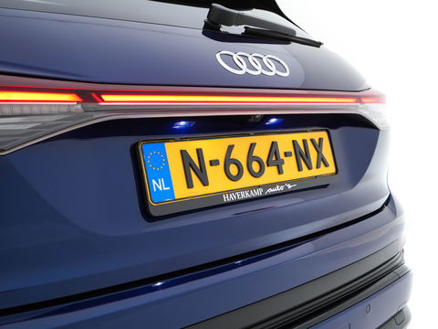 Audi Q4 e-tron 40 S-Line Competition Launch edition 77 kWh [ 3-Fase ] {SOH-87%} (INCL-BTW) *HEAT-PUMP | PANO | LEATHER-FABRIC | MATRIX-LED | ADAPTIVE-CRUISE | HEATED-SPORTSEATS | AMBIENT-LIGHT | DIGI-COCKPIT | CAMERA | KEYLESS | NAVI-FULLMAP | ...