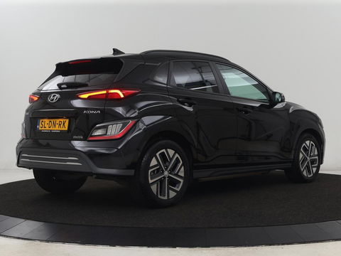 Hyundai KONA EV Business 64 kWh | 3-Fase | Stoelverwarming | Climate control | Adaptive cruise control | Camera | HUD