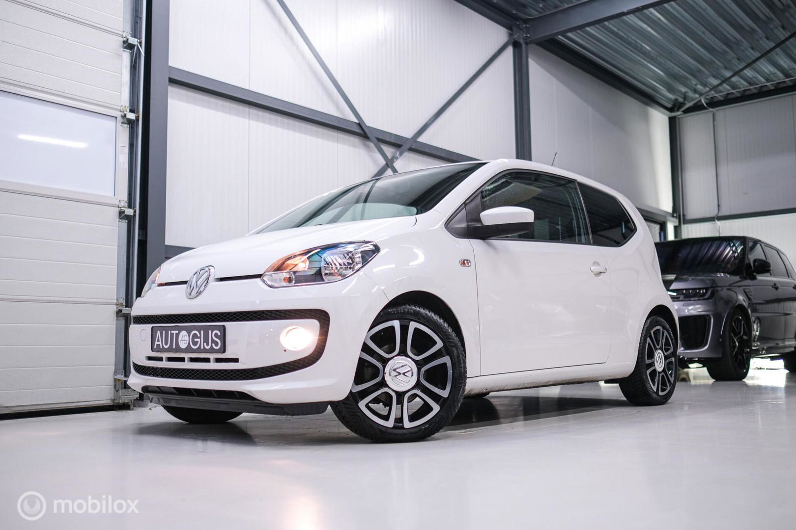 Volkswagen up! 1.0 high up! | Stoelverwarming | Cruise | Mistlampen | LMV | Parkeersensoren | Getint glas | Rijklaar |
