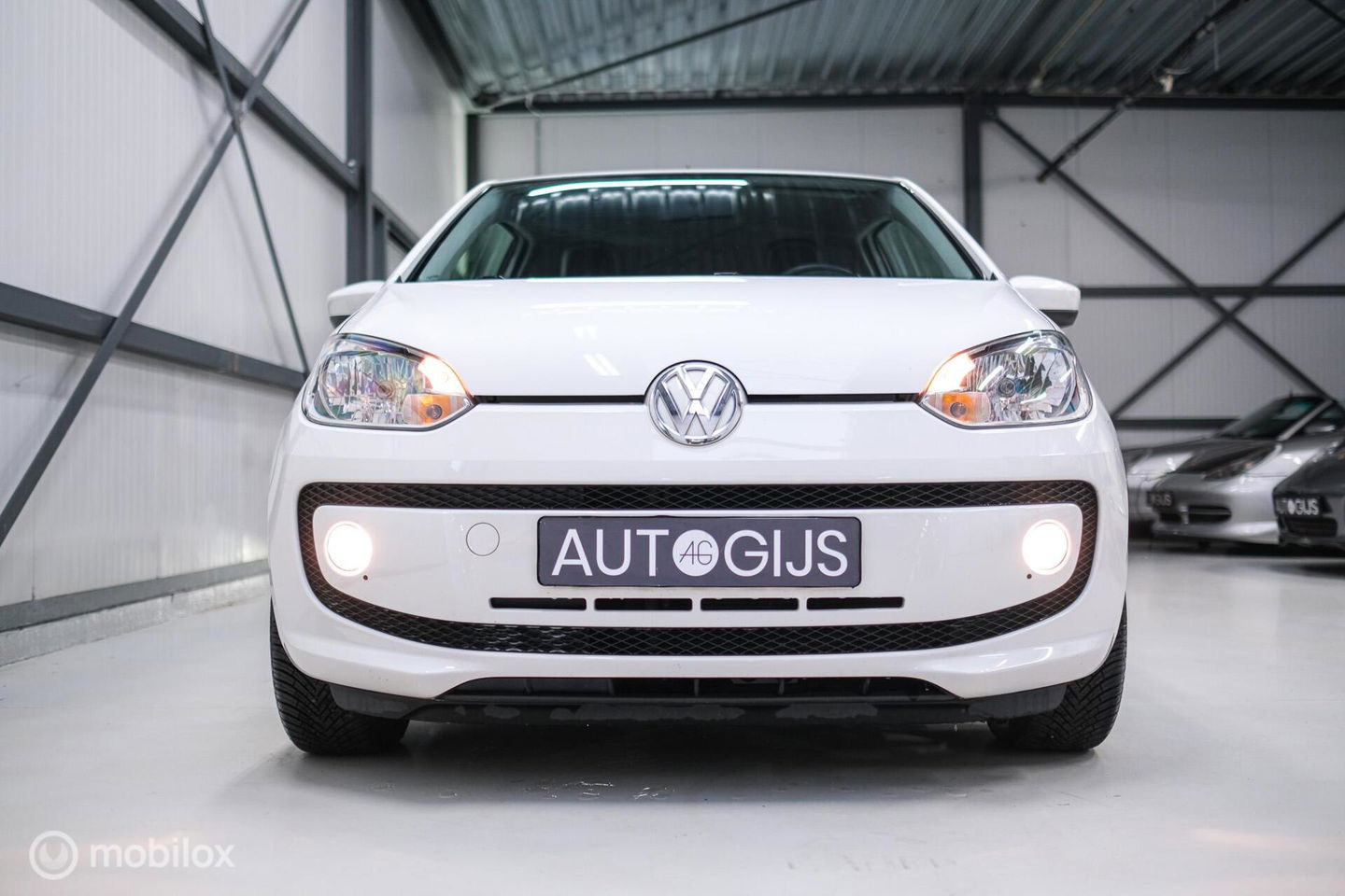 Volkswagen up! 1.0 high up! | Stoelverwarming | Cruise | Mistlampen | LMV | Parkeersensoren | Getint glas | Rijklaar |