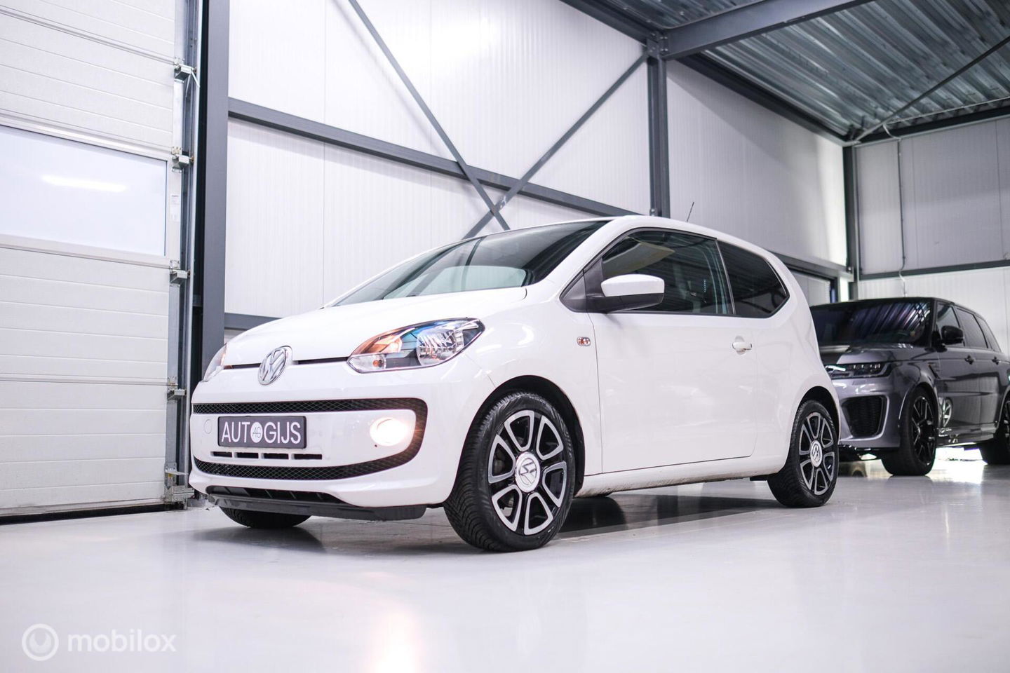 Volkswagen up! 1.0 high up! | Stoelverwarming | Cruise | Mistlampen | LMV | Parkeersensoren | Getint glas | Rijklaar |