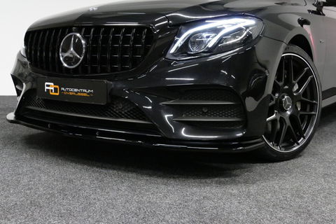 Mercedes-Benz E-Klasse 300 e AMG Line / E63s AMG Diffuser / Panamericana Grille / Panoramadak / Elektr. verstelbare voorstoelen + memory / Burmester Surround Sound / Ambienteverlichting / Apple Carplay - Android Auto / Maxton Design Frontlip / Rondomzichtcamera / Stoelverwarmin