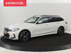 BMW 3-serie 320e M Sport | Panoramadak | Trekhaak | Stoelverwarming | Carplay | Sportstoelen | Leder/Alcantara | Navigatie | Widescreen Display | Sfeerverlichting | Parkeerhulp | PHEV | Plug In