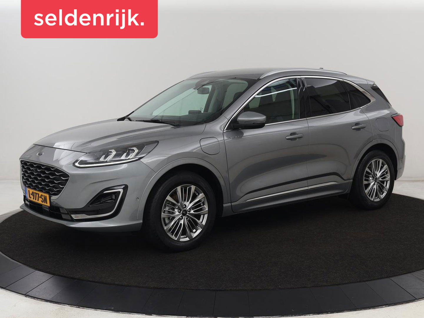Ford Kuga 2.5 PHEV Vignale | Head-Up | Trekhaak | Adaptive cruise | Leder | 360 Camera | Stoelverwarming | Digital Cockpit | Carplay | Dodehoek detectie | Navigatie | Keyless | Achterbankverwarming | Plug In