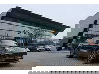 Porsche Macan - 2.0 T 252pk Panoramadak Luchtvering 18-weg Adaptieve Sportstoelen Trekhaak elektrisch 21" LMV