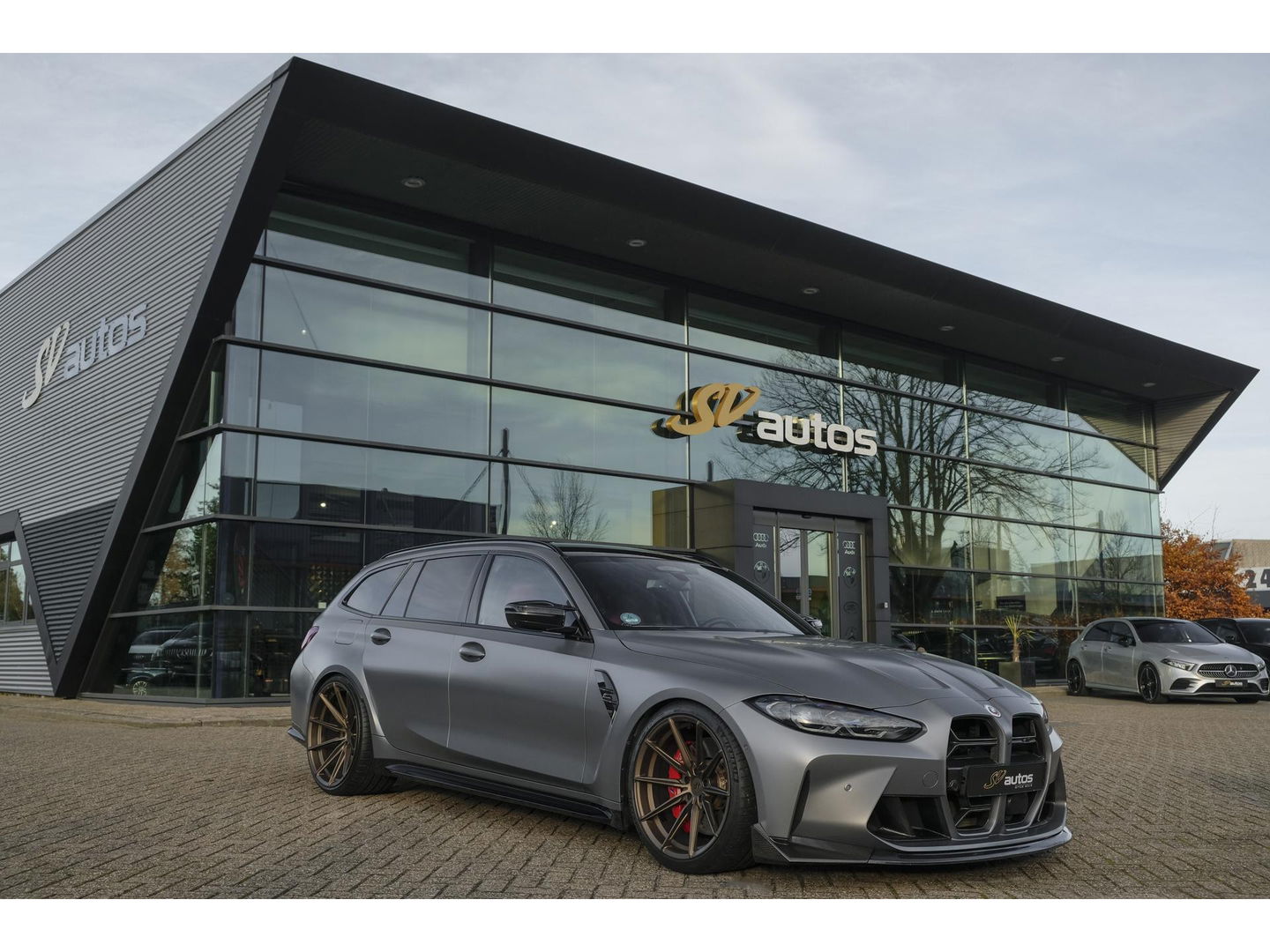 BMW M3 Touring Competition 510pk xDrive Widescreen Frozen grey *BTW* Head-up Adaptive cruise CSL grille 21" LMV