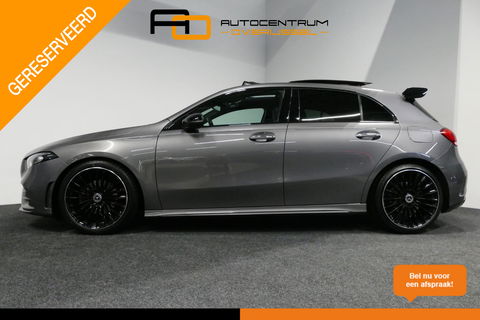 Mercedes-Benz A-Klasse 200 AMG Line / A45 AMG Diffuser / Panamericana Grille / Panoramadak / A45 Dakspoiler / Elektr. verstelbare voorstoelen + memory / Multibeam LED Koplampen / Apple Carplay - Android Auto / Stoelverwarming / Ambienteverlichting / 19'' LMV / Night pakket / Do
