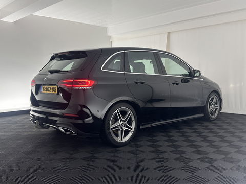 Mercedes-Benz B-Klasse 180 AMG-Line Business Solution (INCL-BTW) *LEATHER-MICROFIBRE | WIDESCREEN-COCKPIT | FULL-LED | BLINDSPOT | CAMERA | NAVI-FULLMAP | DAB+ | ECC | SHIFTPADDLES | CRUISE | HEATED-SPORTSEATS | TOWBAR | 18''ALU*