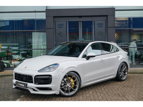 Porsche Cayenne Coupé 3.0 E-Hybrid 462PK Krijtgrijs SportDesign Luchtvering Lightweight Package Carbon Dak 4-wielsturing NLauto