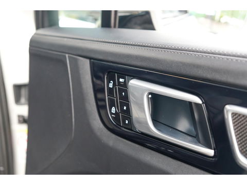 Porsche Cayenne Coupé 3.0 E-Hybrid 462PK Krijtgrijs SportDesign Luchtvering Lightweight Package Carbon Dak 4-wielsturing NLauto