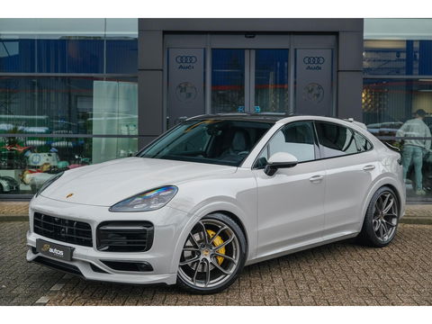 Porsche Cayenne Coupé 3.0 E-Hybrid 462PK Krijtgrijs SportDesign Luchtvering Lightweight Package Carbon Dak 4-wielsturing NLauto