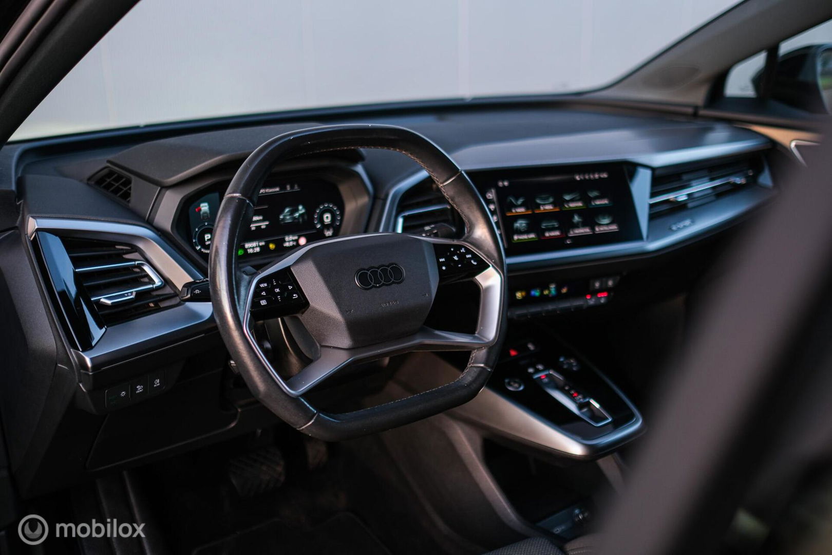 Audi Q4 Sportback e-tron 40 Advanced edition 77 kWh | Sportstoelen | Camera | ACC | NL auto NAP |