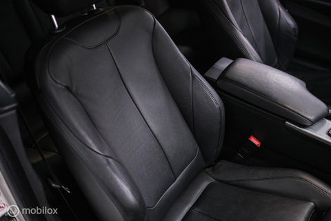 BMW 4 Serie Coupé 430i Centennial High Executive | Veel opties | Adaptive | Lane assist | Trekhaak | Leder | Stuurwiel verwarmd | Navipro |