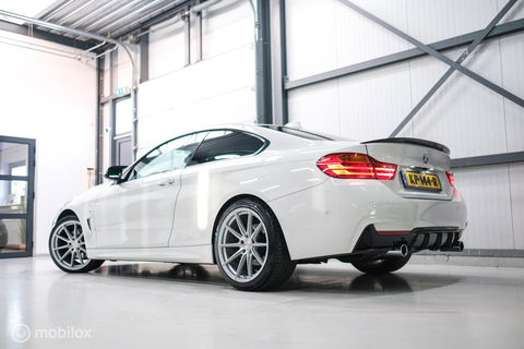 BMW 4 Serie Coupé 430i Centennial High Executive | Veel opties | Adaptive | Lane assist | Trekhaak | Leder | Stuurwiel verwarmd | Navipro |