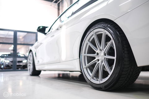 BMW 4 Serie Coupé 430i Centennial High Executive | Veel opties | Adaptive | Lane assist | Trekhaak | Leder | Stuurwiel verwarmd | Navipro |