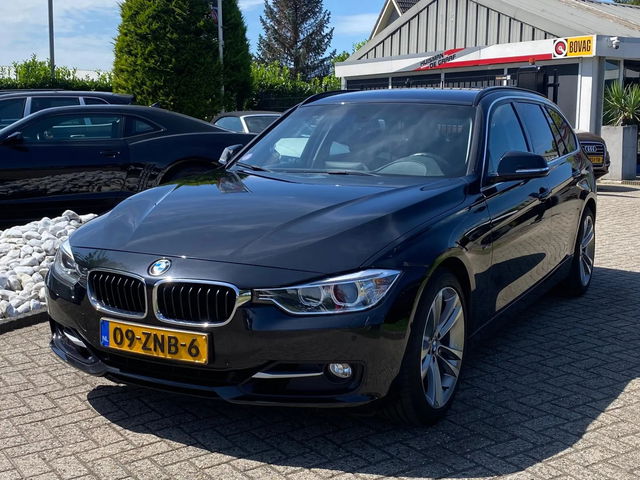 BMW 3 Serie - 320i Touring High Exe Sportline Automaat 2013 Zwart