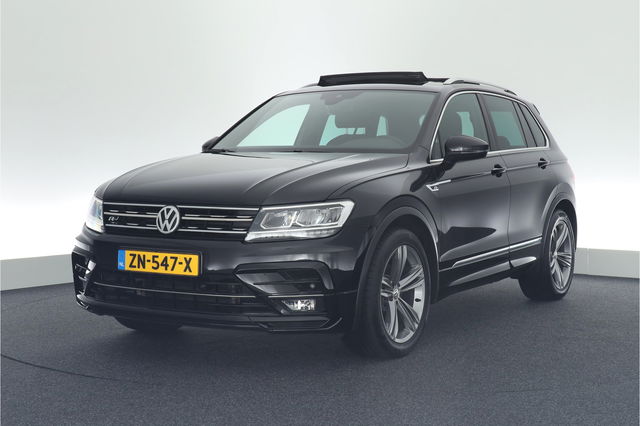 Volkswagen Tiguan - 1.5 TSI 150pk DSG ACT R-Line Highline Trekhaak Virtual Cockpit Panoramadak Stoelverwarming Navigatie