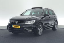 Volkswagen Tiguan - 1.5 TSI 150pk DSG ACT R-Line Highline Trekhaak Virtual Cockpit Panoramadak Stoelverwarming Navigatie