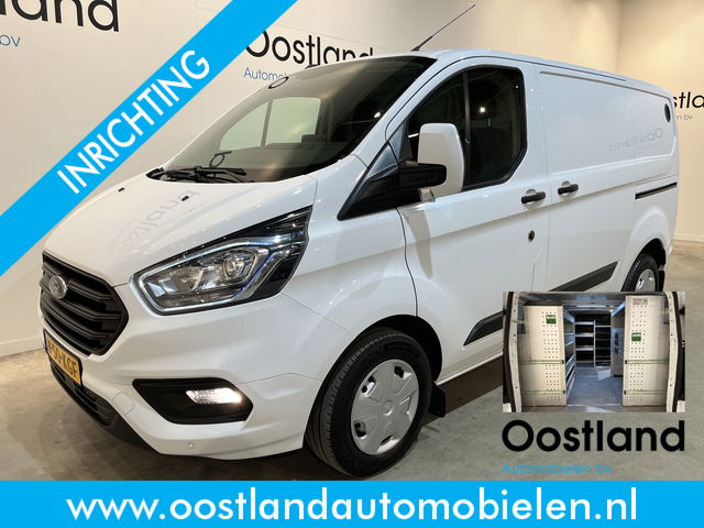 Ford Transit Custom - 300 2.0 TDCI L1H1 Trend 130 PK / Servicebus / Bott Inrichting / Euro 6 / Schuifdeur L + R / Airco / CarPlay / Klep / PDC / Navigatie / 3-Zits