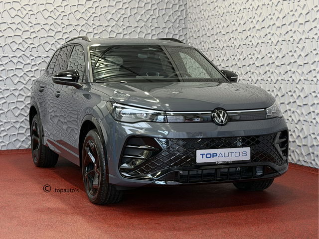Volkswagen Tiguan - 1.5 eHYBRID 272PK NW AUTO R-LINE PANO XL.NAVI BLACK.STYLE 360.CAM ELEK.KLEP MATRIX.LED 20''LMV MASSAGE PHEV PLUG IN HYBRID "Volkswagen rijden begint bij Topautos.nl – 75 topmodellen direct op voorraad!"