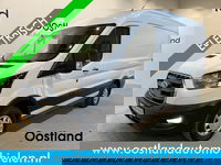 Ford E-Transit - 350 L2H2 Trend 68 kWh 184 PK / 100% Elektrisch !! / Airco / Cruise Control / CarPlay / Camera / Navigatie / 3-Zits / 12.200 KM !!