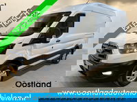 Ford E-Transit - 350 L2H2 Trend 68 kWh 184 PK / 100% Elektrisch !! / Airco / Cruise Control / CarPlay / Camera / Navigatie / 3-Zits / 10.350 KM !!