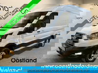 Ford E-Transit - 350 L2H2 Trend 68 kWh / 100% Elektrisch !! / Airco / Cruise Control / CarPlay / Camera / Navigatie / 3-Zits / 12.200 KM !!