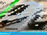 Ford E-Transit - 350 L2H2 Trend 68 kWh / 100% Elektrisch !! / Airco / Cruise Control / CarPlay / Camera / Navigatie / 3-Zits / 5.300 KM !!