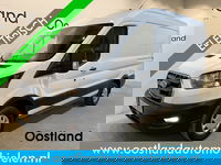 Ford E-Transit - 350 L2H2 Trend 68 kWh / 100% Elektrisch !! / Airco / Cruise Control / CarPlay / Camera / Navigatie / 3-Zits / 6.600 KM !!
