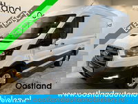 Ford E-Transit - 350 L2H2 Trend 68 kWh / 100% Elektrisch !! / Airco / Cruise Control / CarPlay / Camera / Navigatie / 3-Zits / 10.400 KM !!