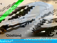 Ford E-Transit - 350 L2H2 Trend 68 kWh / 100% Elektrisch !! / Airco / Cruise Control / CarPlay / Camera / Navigatie / 3-Zits / 6.500 KM !!