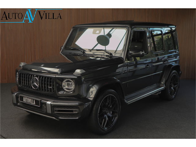 Mercedes-Benz G-Klasse - G63 AMG Panodak Carbon Burmester Leer 360 PTS Open dak Navi Memory Stoelventilatie Stoelverwarming Climate NL auto