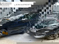 BMW 2 Serie - Active Tourer 218i High Executive | AUTOMAAT | HEAD-UP DISPLAY | LEDER | SCHUIF/KANTELDAK | NAVI XL | CAMERA | CRUISE CONTROL | CLIMATE CONTROL | PDC V+A | LMV 17'' | STOELVERWARMING | BLUETOOTH