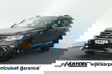 Volkswagen Tiguan - 1.5 TSI 150pk DSG R-Line Trekhaak Head-Up Stoelverwarming Virtual Cockpit Navigatie