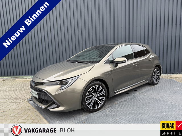 Toyota Corolla - 1.8 Hybrid Style | Schuif/- kantel dak | Afnm. Trekhaak | Oxide Brons | Rijklaar!!