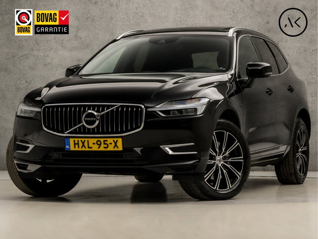 Volvo XC60 - 2.0 T8 Twin Engine AWD Inscription 391Pk Automaat (PANORAMADAK, APPLE CARPLAY, HARMAN/KARDON, MEMORY SEATS, ZWART HEMEL, STOELVERWARMING VOOR/ACHTER, LUXE LEDER, TREKHAAK, CAMERA, STUURWIEL VERWARMD, NIEUWSTAAT)