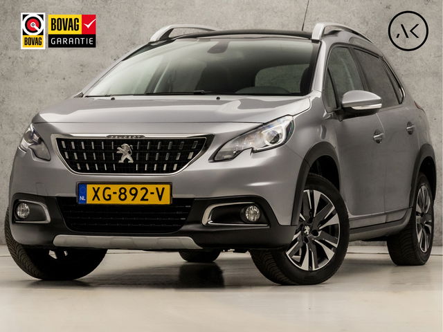 Peugeot 2008 - 1.2 PureTech Allure Sport Automaat (PANORAMADAK, APPLE CARPLAY, NAVIGATIE, CLIMATE, LEDER, GETINT GLAS, SPORTSTOELEN, PARKEERSENSOREN, LM VELGEN, TREKHAAK, NIEUWSTAAT)