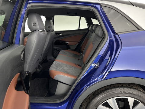 Volkswagen ID.4 First 77 kWh [ 3-Fase-11kW ] {SOH-83%} (INCL-BTW) *LEATHER-MICROFIBRE | FULL-LED | ADAPTIVE-CRUISE | HEATED-COMFORTSEATS | DIGI-COCKPIT | AMBIENTLIGHT | NAVI-FULLMAP | PDC | TOWBAR | PRIVACY-GLASS | CAMERA | 20''ALU*
