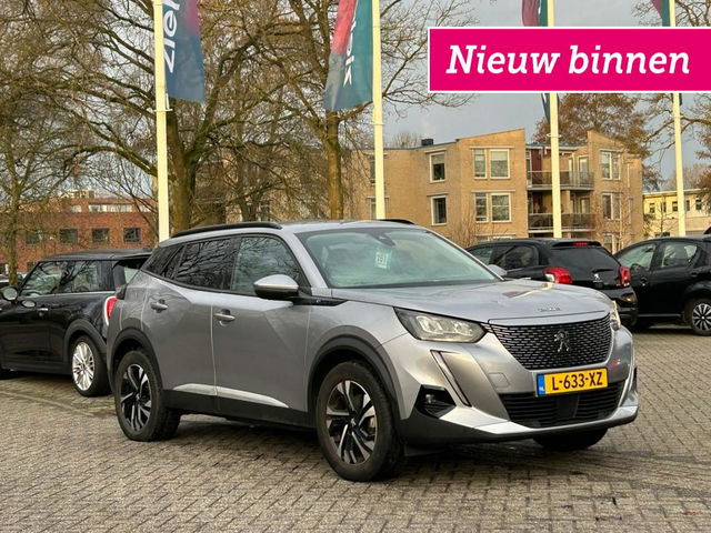 Peugeot e-2008 - Allure Pack 50 kWh - Carplay, Digitaal Cockpit, Half Leer, Navi, Cruise, Camera, Stoelverw. Afn. Trekhaak