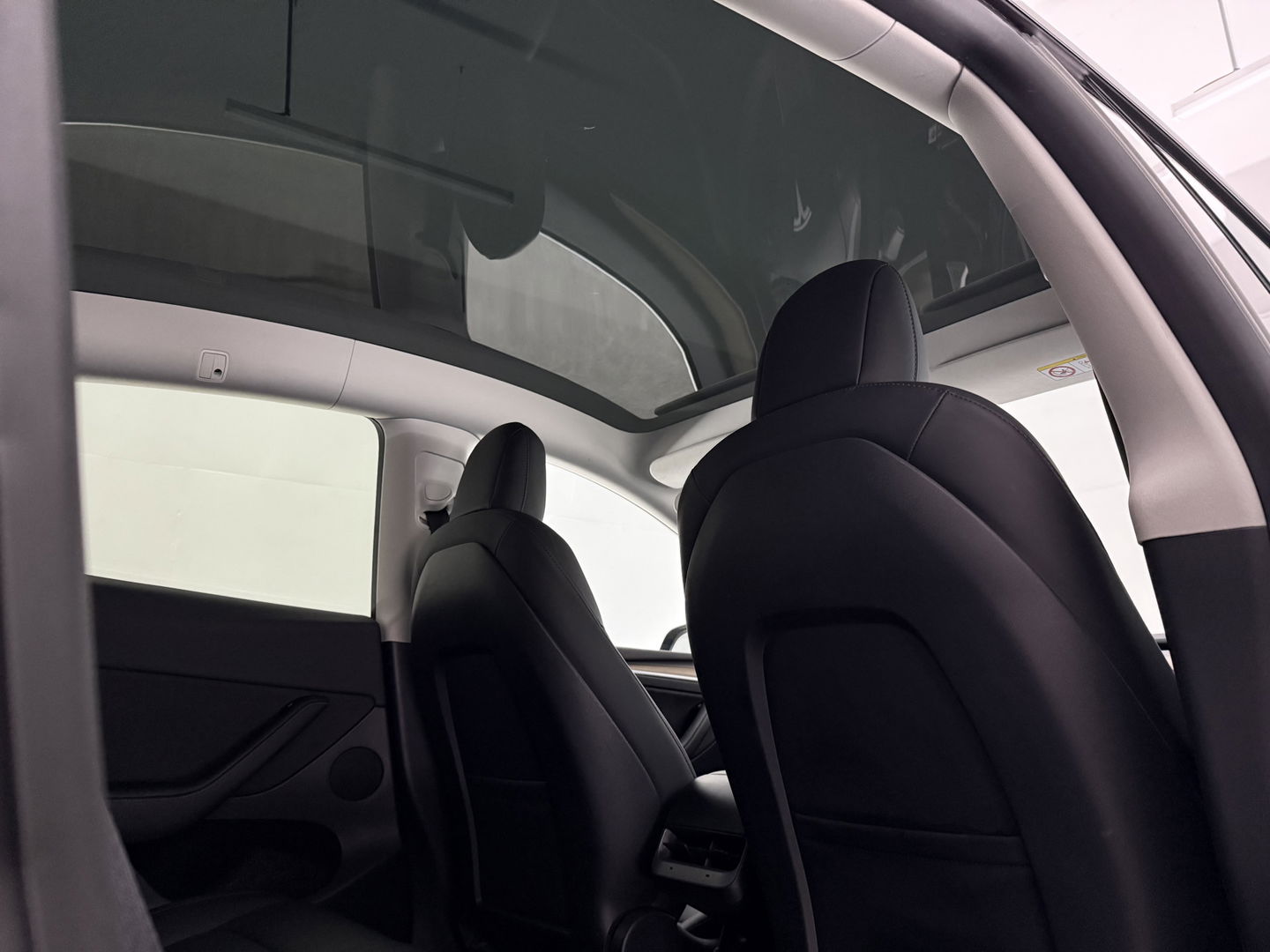 Tesla Model Y Long Range AWD 75 kWh | SOH 91% | Snelladen | Autopilot | Pano | Memory | Camera | Adap. Cruise | Stoel/Stuur verw.